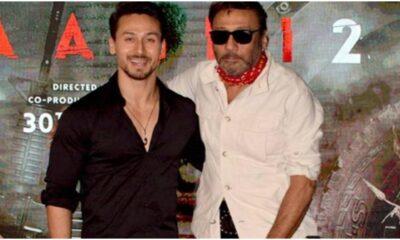 Jackie Shroff and Tiger Shroff posing together at a film event. The veteran actor recently opened up about how his son deals with box office setbacks and expressed pride in his resilience.