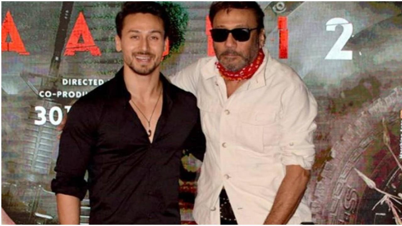 Jackie Shroff and Tiger Shroff posing together at a film event. The veteran actor recently opened up about how his son deals with box office setbacks and expressed pride in his resilience.