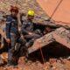 Emergency workers and volunteers search for survivors amid the rubble in the High Atlas Mountains following the catastrophic earthquake in Morocco.